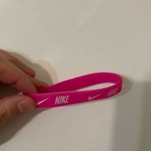 Pink nike bracelet